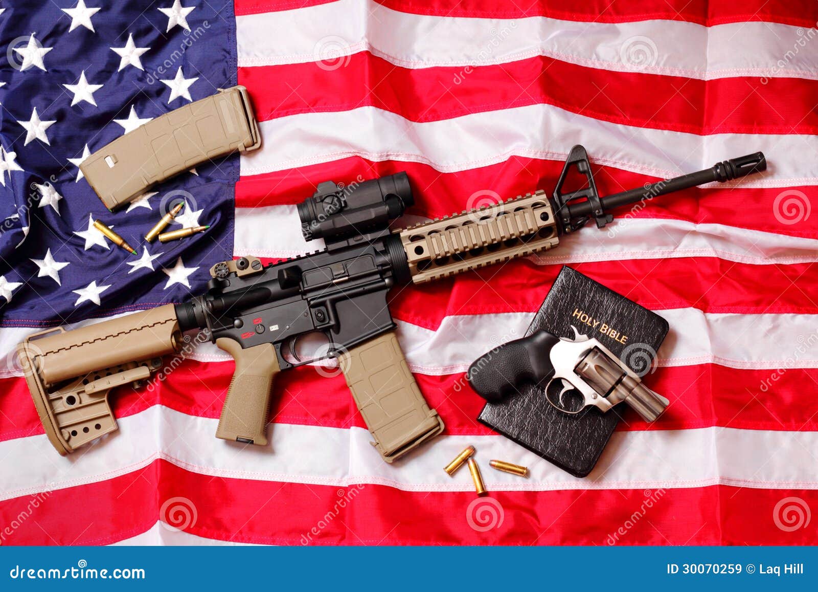ar-rifle-bible-colt-pistol-few-bullets-laying-american-flag-shallow-depth-field-30070259